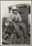 Mexican labor contractor in carrot field near Santa Maria, Texas