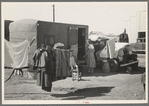 Trailer home and truck of white migrant family, Weslaco, Texas