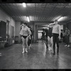 Lee Theodore [left] and unidentified others in rehearsal for the stage production Flora, the Red Menace