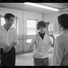 Lee Theodore [center] and unidentified others in rehearsal for the stage production Flora, the Red Menace