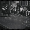 George Abbott [front] and unidentified others in rehearsal for the stage production Flora, the Red Menace