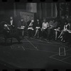 George Abbott [front] and unidentified others in rehearsal for the stage production Flora, the Red Menace