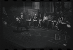 George Abbott [front] and unidentified others in rehearsal for the stage production Flora, the Red Menace