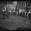 George Abbott [front] and unidentified others in rehearsal for the stage production Flora, the Red Menace