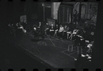 George Abbott [front] and unidentified others in rehearsal for the stage production Flora, the Red Menace