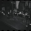 George Abbott [front] and unidentified others in rehearsal for the stage production Flora, the Red Menace