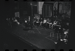 George Abbott [front] and unidentified others in rehearsal for the stage production Flora, the Red Menace