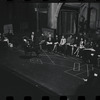 George Abbott [front] and unidentified others in rehearsal for the stage production Flora, the Red Menace