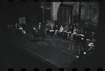George Abbott [front] and unidentified others in rehearsal for the stage production Flora, the Red Menace