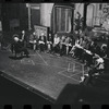 George Abbott [front] and unidentified others in rehearsal for the stage production Flora, the Red Menace