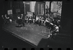 George Abbott [front] and unidentified others in rehearsal for the stage production Flora, the Red Menace