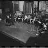 George Abbott [front] and unidentified others in rehearsal for the stage production Flora, the Red Menace