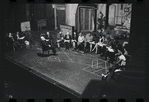 George Abbott [front] and unidentified others in rehearsal for the stage production Flora, the Red Menace