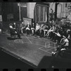 George Abbott [front] and unidentified others in rehearsal for the stage production Flora, the Red Menace