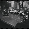George Abbott [front] and unidentified others in rehearsal for the stage production Flora, the Red Menace