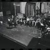 George Abbott [front] and unidentified others in rehearsal for the stage production Flora, the Red Menace