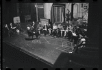 George Abbott [front] and unidentified others in rehearsal for the stage production Flora, the Red Menace