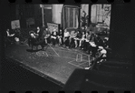 George Abbott [front] and unidentified others in rehearsal for the stage production Flora, the Red Menace