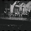George Abbott [front] and unidentified others in rehearsal for the stage production Flora, the Red Menace