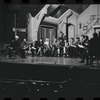 George Abbott [front] and unidentified others in rehearsal for the stage production Flora, the Red Menace