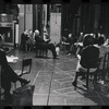 George Abbott [center] and unidentified others in rehearsal for the stage production Flora, the Red Menace