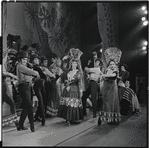 Irra Petina [center] and ensemble in the 1956 stage production Candide