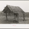 Animal shelter on sharecropper's farm near Pace, Mississippi. Background photo for Sunflower Plantation