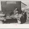 Migrant girl sitting in back of car, Weslaco, Texas