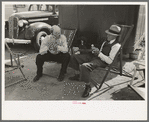 Tourists traveling in trailers talking in camp, McAllen, Texas