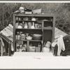 Detail of kitchen cabinet on trailer of white migrant near Harlingen, Texas