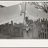 Back yard in Mexican district with laundry on line, San Antonio, Texas