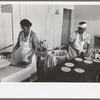Making tortillas in bake shop, San Antonio, Texas. Tortillas are made of corn flour which is very finely ground and mashed corn. No moisture or baking powder or salt is added