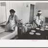 Making tortillas in bake shop, San Antonio, Texas. Tortillas are made of corn flour which is very finely ground and mashed corn. No moisture or baking powder or salt is added