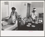 Making tortillas in bake shop, San Antonio, Texas. Tortillas are made of corn flour which is very finely ground and mashed corn. No moisture or baking powder or salt is added