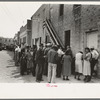 Crowd of people waiting at WPA clothing department, San Antonio, Texas