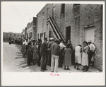 Crowd of people waiting at WPA clothing department, San Antonio, Texas