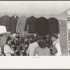 Mexicans looking at suits for sale, San Antonio, Texas