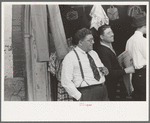 Proprietor of credit clothing store, Mexican district, San Antonio, Texas
