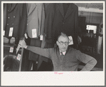 Proprietor of credit clothing store in Mexican district, San Antonio, Texas