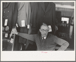 Proprietor of credit clothing store in Mexican district, San Antonio, Texas