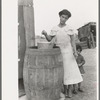 San Antonio. The Mexican section. Water supply of Mexican family living on the outskirts of town. This water is brought from the city and is delivered by wagon