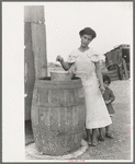 San Antonio. The Mexican section. Water supply of Mexican family living on the outskirts of town. This water is brought from the city and is delivered by wagon