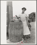 San Antonio. The Mexican section. Water supply of Mexican family living on the outskirts of town. This water is brought from the city and is delivered by wagon