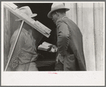 Negro Preacher reading the scriptures to Negro man, San Antonio, Texas