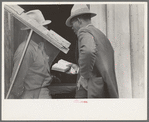 Negro Preacher reading the scriptures to Negro man, San Antonio, Texas