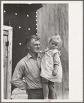 Cut-over farmer and daughter, near Northome, Minnesota