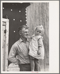 Cut-over farmer and daughter, near Northome, Minnesota