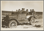 The Harshenberger family going to town in their car near Antelope, Montana