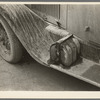 Water, oil and gas on farmer's car. Williston, North Dakota