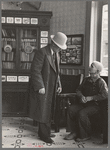 Two men talking in the Great Northern Hotel, Williston, North Dakota